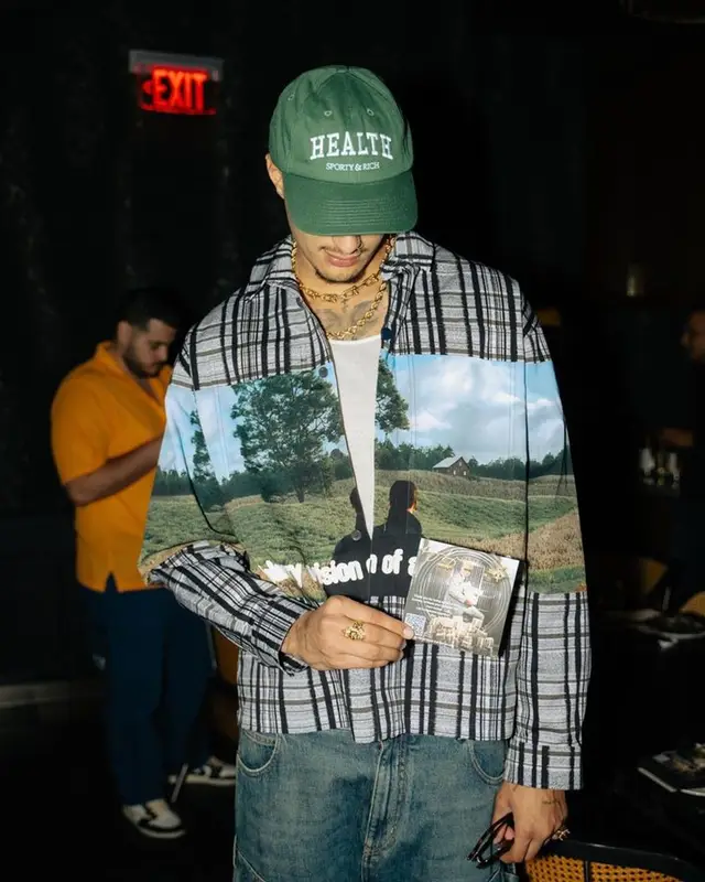 Kyle Kuzma outfit in Louis Vuitton and Sporty And Rich, 2023