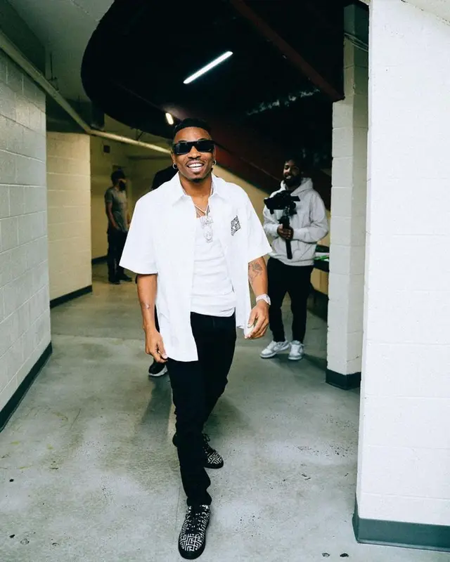 Mayorkun outfit in Givenchy, Amiri, and Balmain, 2022