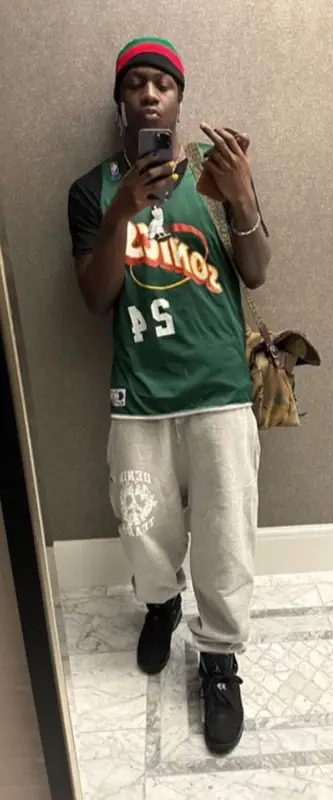 Lil Yachty outfit in Champion, Denim Tears, and Chanel, 2023