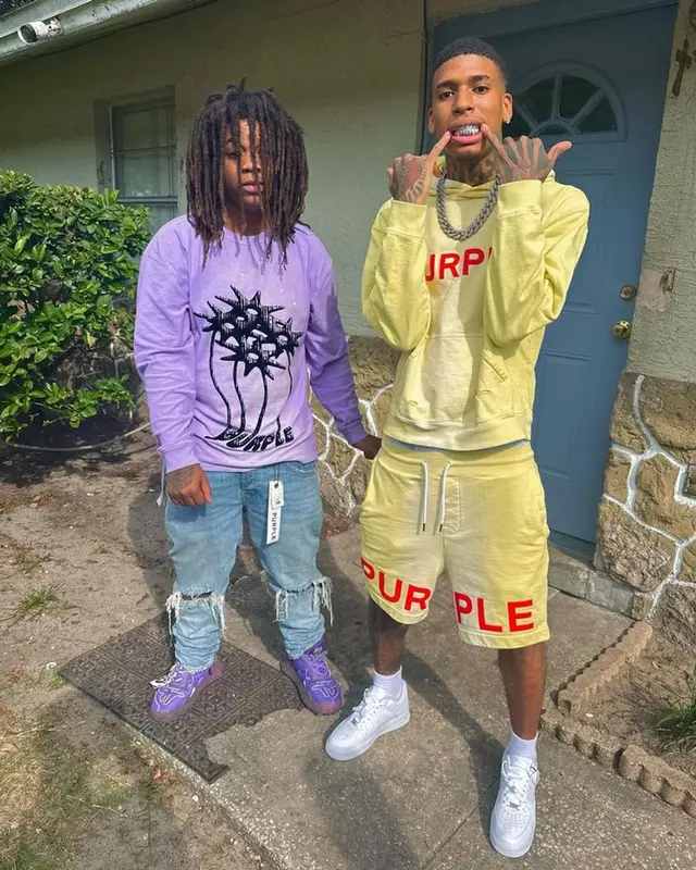 NLE Choppa outfit in Purple Brand, Nike, and Alfani, 2023