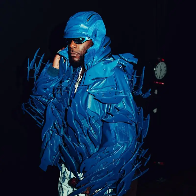 Burna Boy outfit in Kusikohc, Louis Vuitton, and Bottega Veneta, 2023