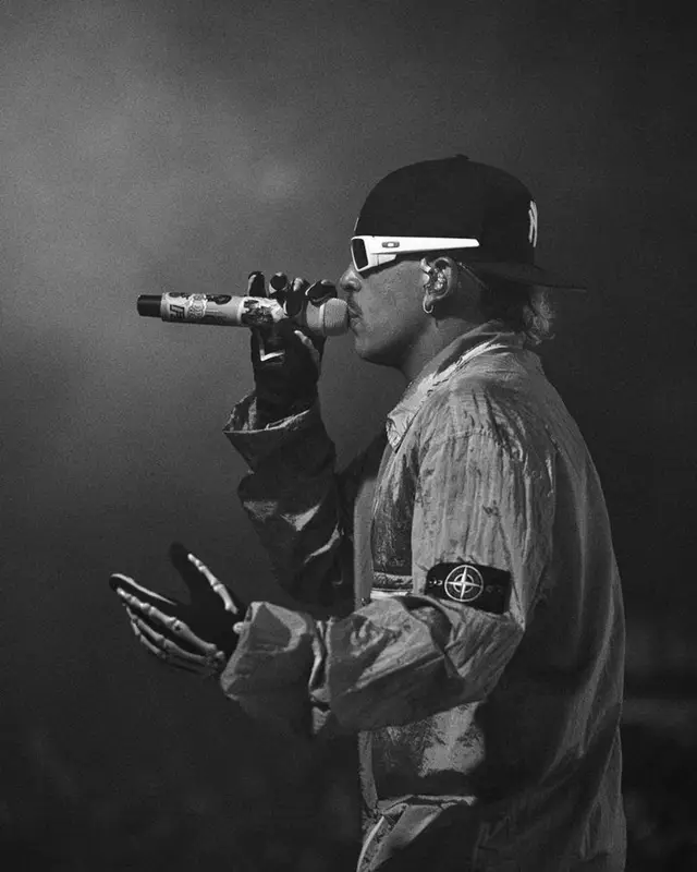 Feid outfit in Stone Island, Oakley, and New Era, 2023