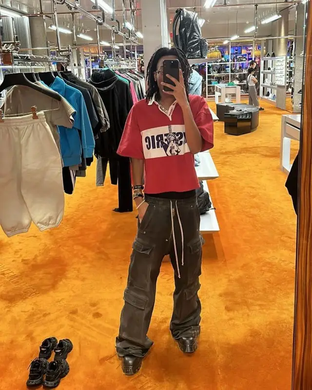 Lil Tecca outfit in Hysteric Glamour, Rick Owens, and Chrome Hearts, 2023