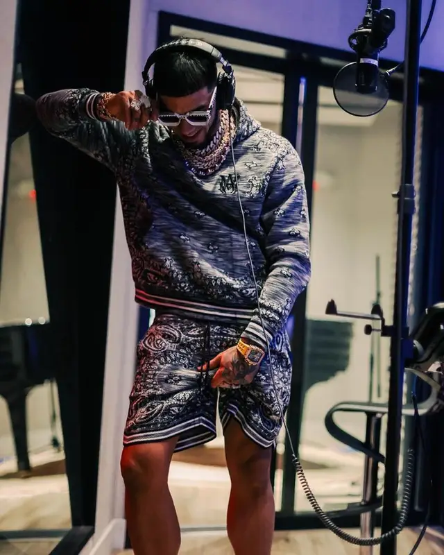 Anuel AA outfit in Amiri, Richard Mille, and Louis Vuitton, 2023