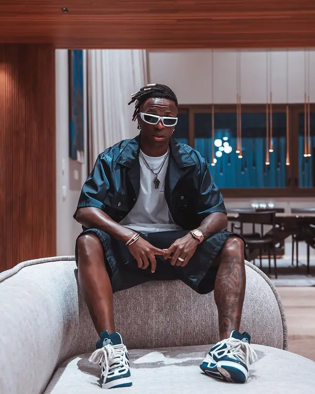 Vinicius Jr outfit in Louis Vuitton and Prada, 2023