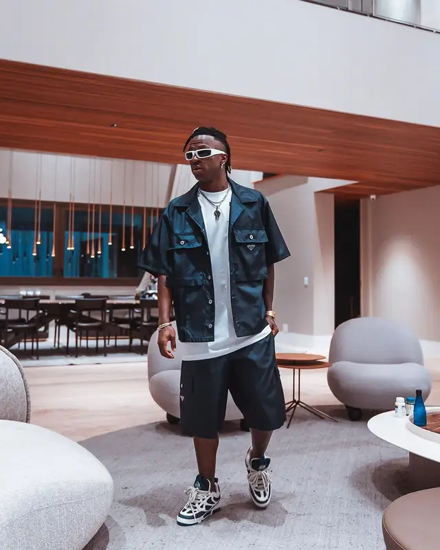 Vinicius Jr outfit in Louis Vuitton and Prada, 2023