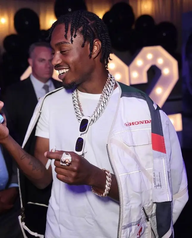 Lil Tjay outfit in Hanes, Amiri, and Prada, 2023