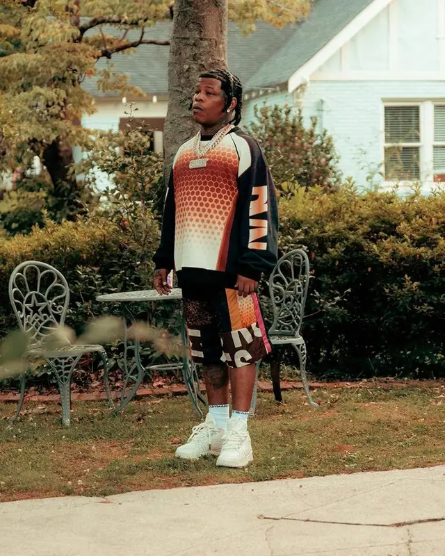 Rylo Rodriguez outfit in Dries Van Noten, Bape, and Readymade, 2023