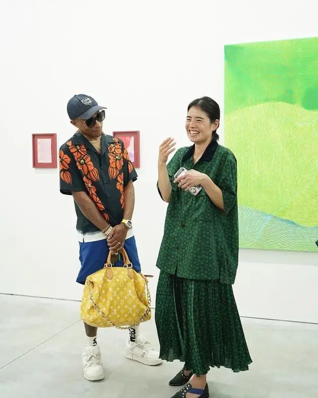 Pharrell Williams outfit in Prada, Louis Vuitton, and Human Made, 2023