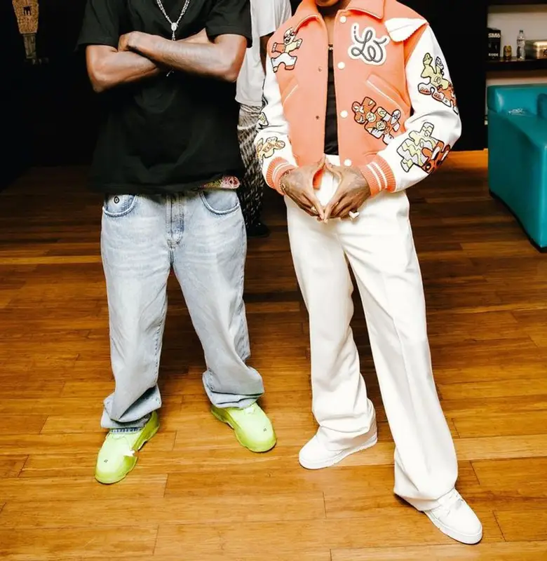 Wizkid outfit in Louis Vuitton and Cartier, 2023