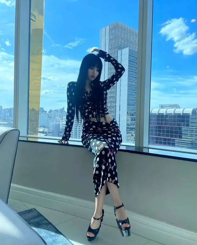 Jeon Soyeon outfit in Versace and Pleaser, 2023