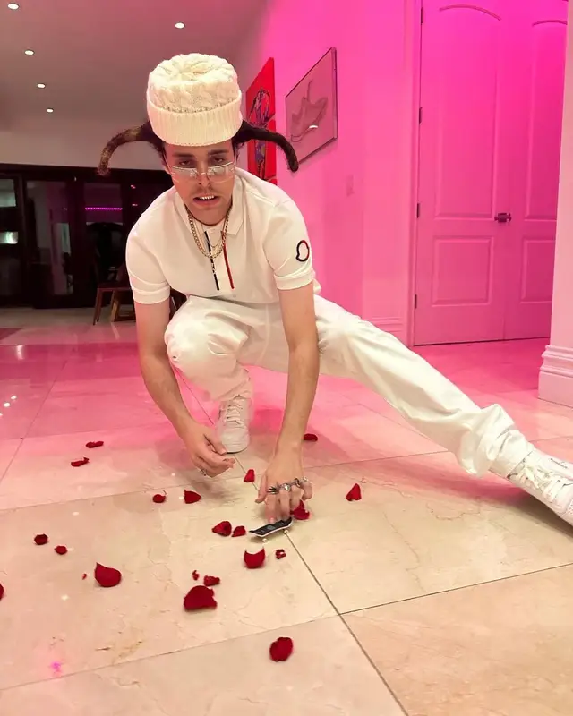 BLP Kosher outfit in Moncler, AG Jeans, and Chanel, 2023