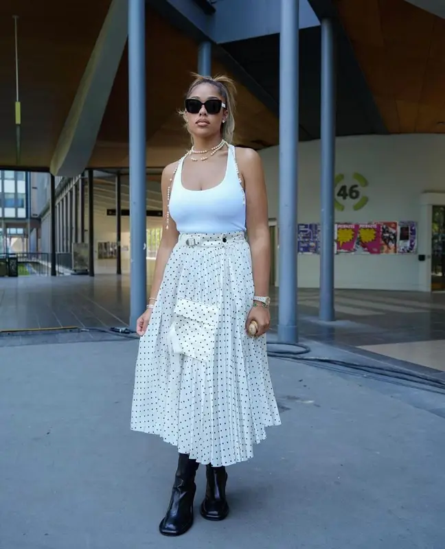 Jordyn Woods outfit in Bottega Veneta, Judith Leiber Couture, and Chanel, 2023