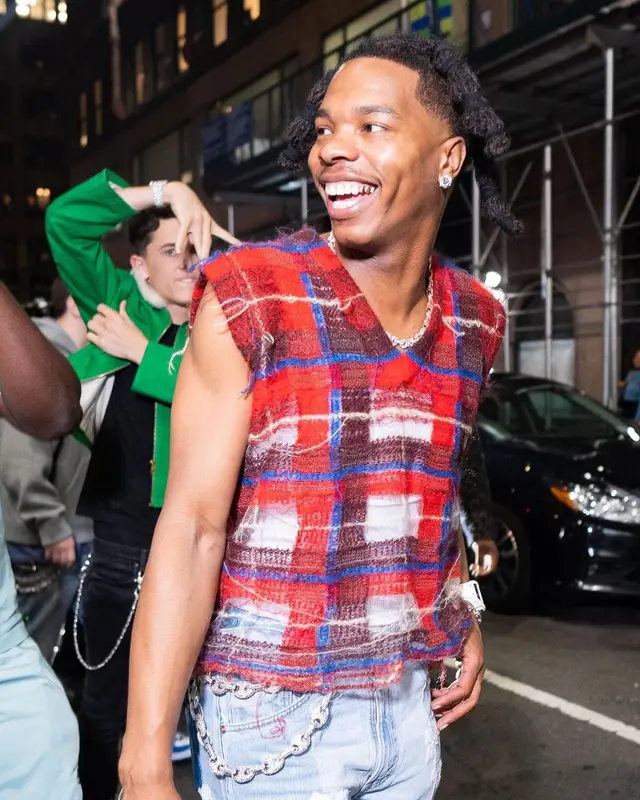 Lil Baby outfit in Maison Margiela, Readymade, and Denim Tears, 2023