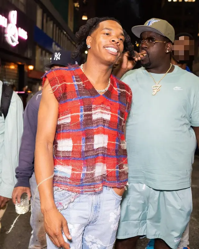 Lil Baby outfit in Maison Margiela, Readymade, and Denim Tears, 2023