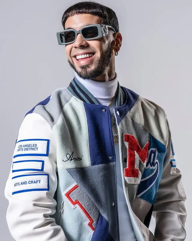 Anuel AA outfit in Amiri, Louis Vuitton, and Gucci, 2023