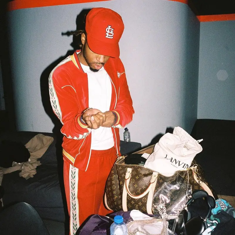 Metro Boomin outfit in Casablanca, Louis Vuitton, and New Era, 2023