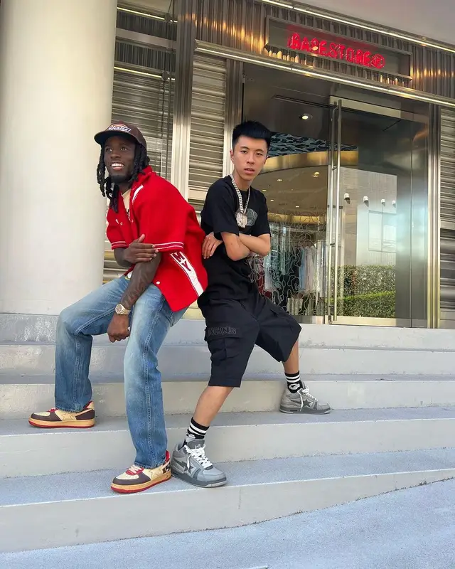 Kai Cenat outfit in Bape, Supreme, and Dickies, 2023
