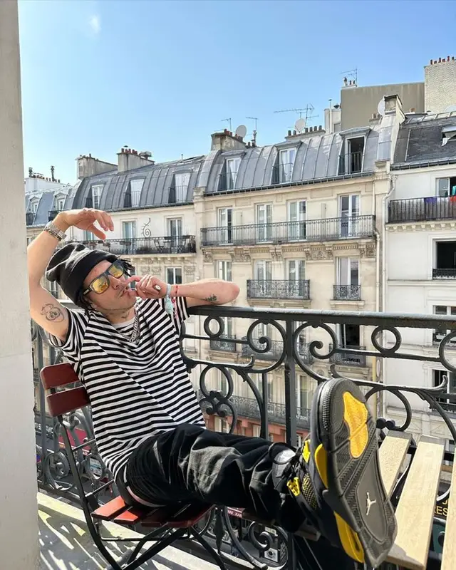 Kidd Keo outfit in Amiri, Jordan, and Burberry, 2023