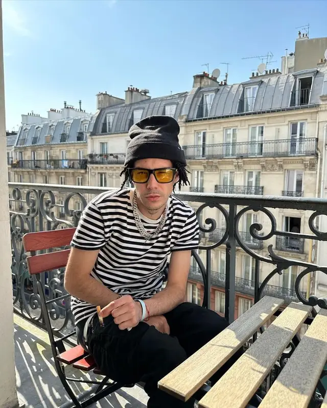 Kidd Keo outfit in Amiri, Jordan, and Burberry, 2023