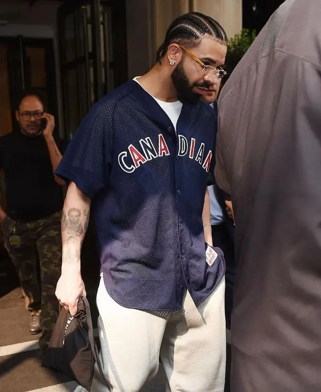 Drake outfit in Molson Canadian, Loewe, and Maybach Eyewear, 2023
