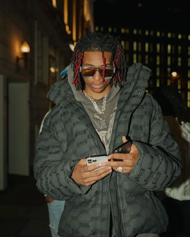 Michael Olise outfit in Balenciaga, Vlone, and Louis Vuitton, 2023