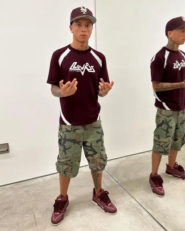 Central Cee outfit in Louis Vuitton, GAP, and New Era, 2023