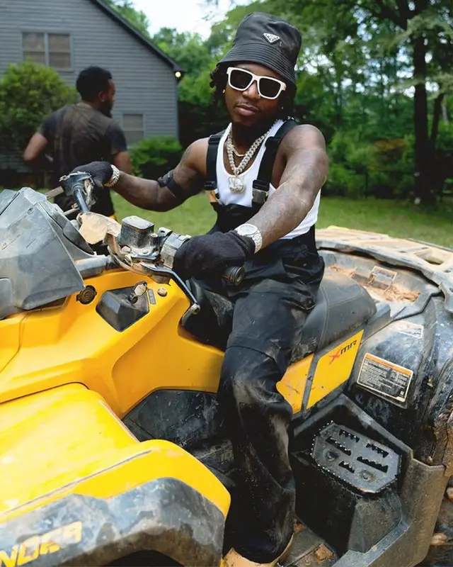 Jacquees outfit in Timberland and Prada, 2023
