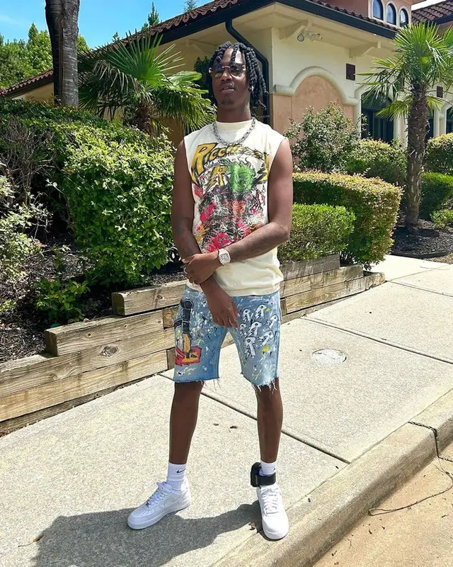 Yung Mal outfit in Ricchezza Forever, Cartier, and Nike, 2023