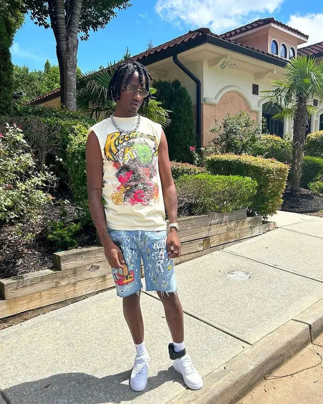 Yung Mal outfit in Ricchezza Forever, Cartier, and Nike, 2023