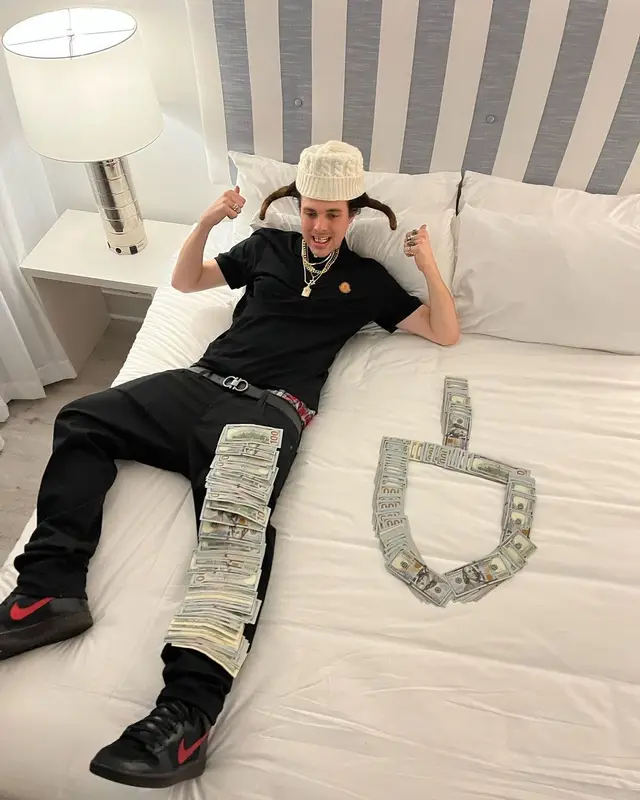 BLP Kosher outfit in Moncler, AG Jeans, and Ferragamo, 2023