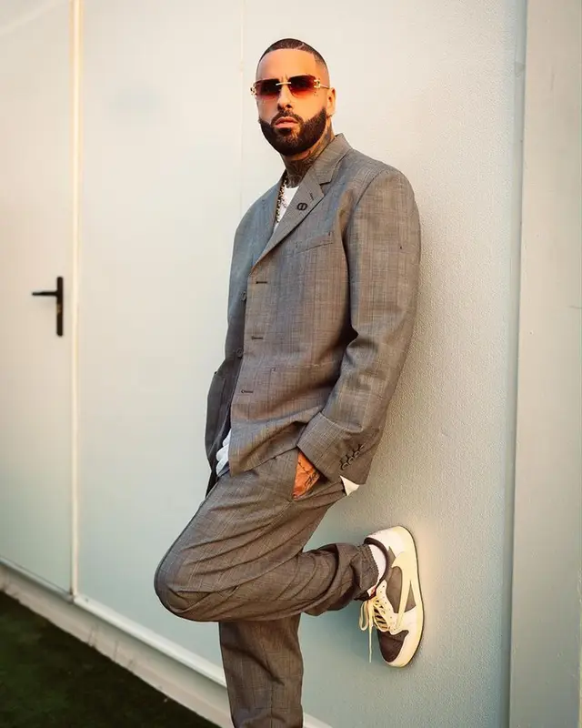 Nicky Jam outfit in Dior, Nike, and Cartier, 2023