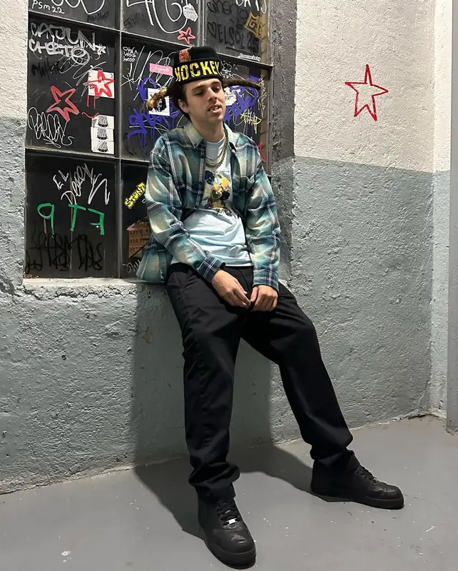BLP Kosher outfit in Supreme, AG Jeans, and Nike, 2023