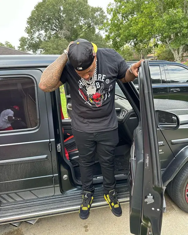 Finesse2tymes outfit in Stranger Things Merch, Jordan, and New Era, 2023