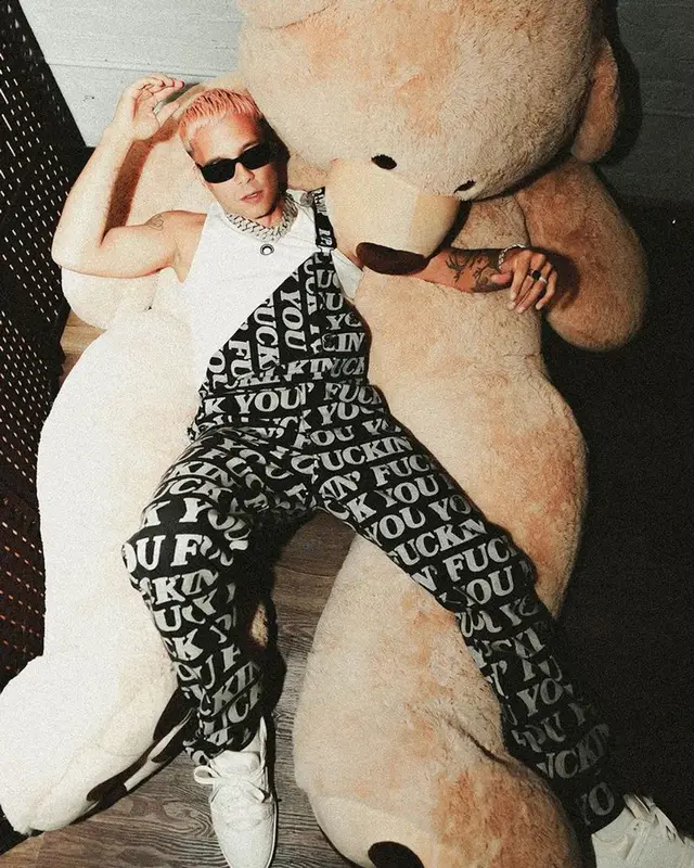 Nio Garcia outfit in Marine Serre, Prada, and Ripndip, 2023
