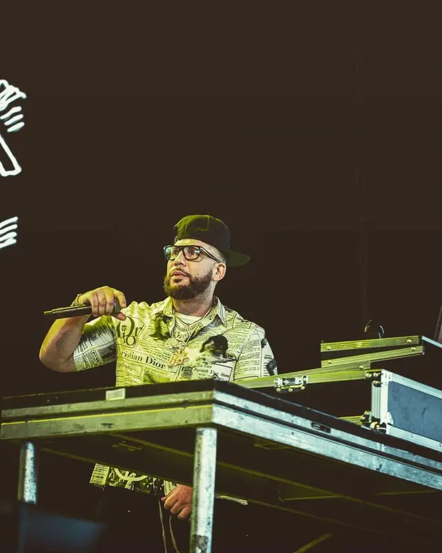 DJ Drama outfit in Dior, Tom Ford, and ERL, 2023