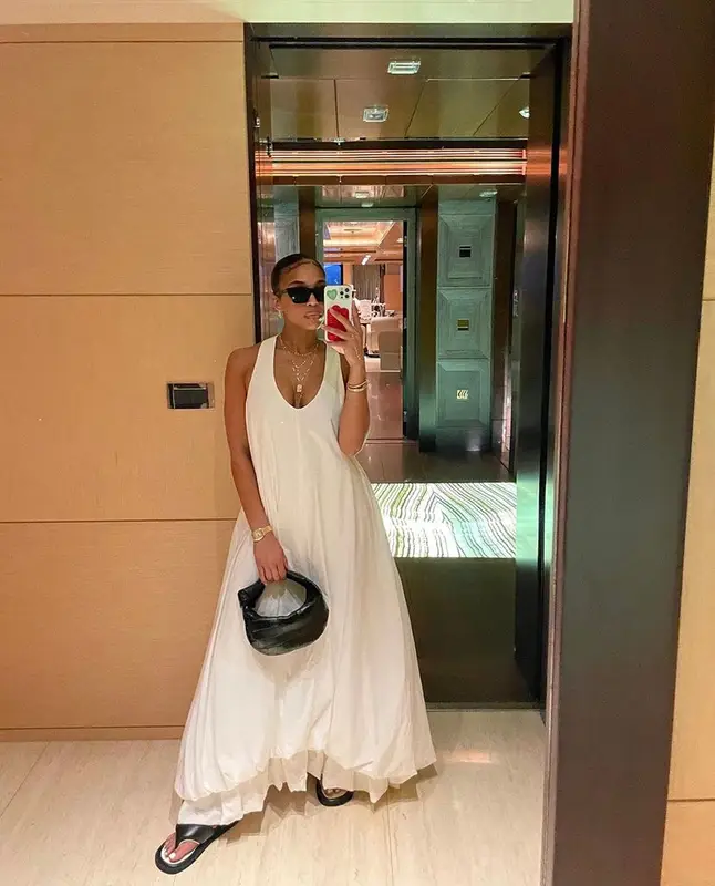 Lori Harvey outfit in Bottega Veneta, Saint Laurent, and The Row, 2023