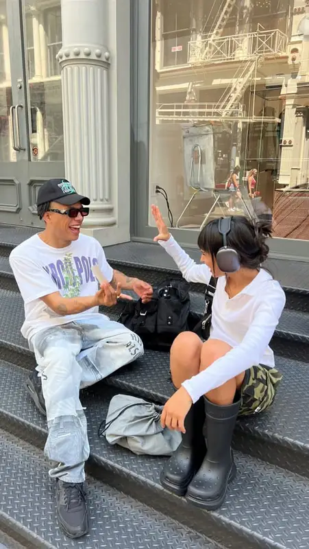 Dina Ayada outfit in Bape, Balenciaga, and Apple, 2023