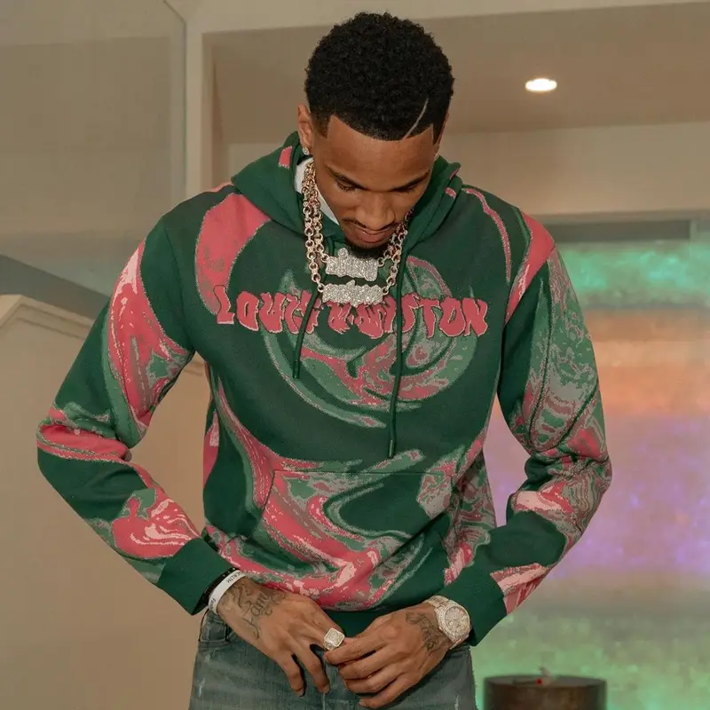 Dejounte Murray outfit in Louis Vuitton and Amiri, 2023