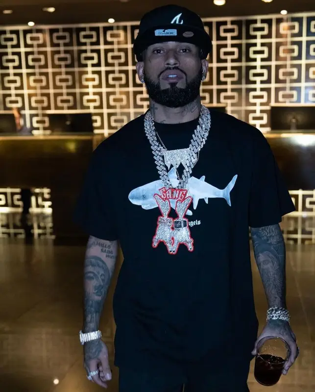 Bryant Mayers outfit in Palm Angels, Burberry, and New Era, 2023