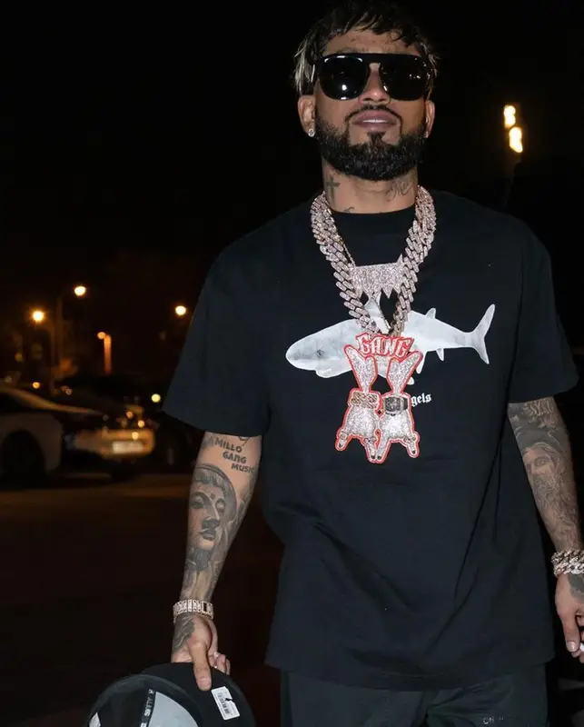 Bryant Mayers outfit in Palm Angels, Burberry, and New Era, 2023