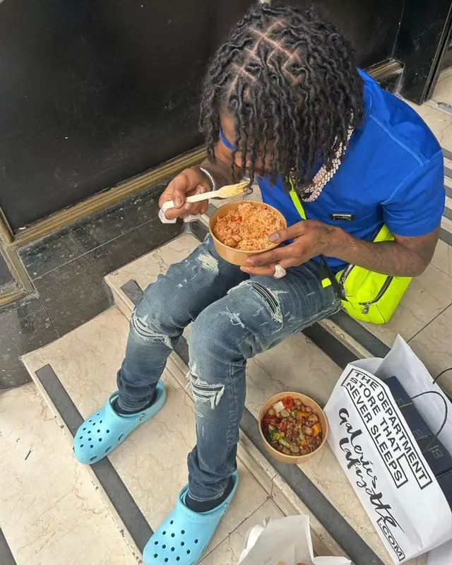 Russ Millions outfit in Dolce & Gabbana, Amiri, and Louis Vuitton, 2023