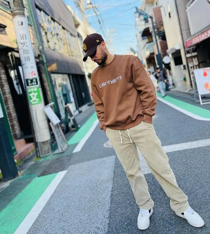 KR$NA outfit in Carhartt, Nike, and New Era, 2023