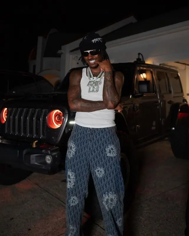 Duke Dennis outfit in Dior, Louis Vuitton, and Denim Tears, 2023