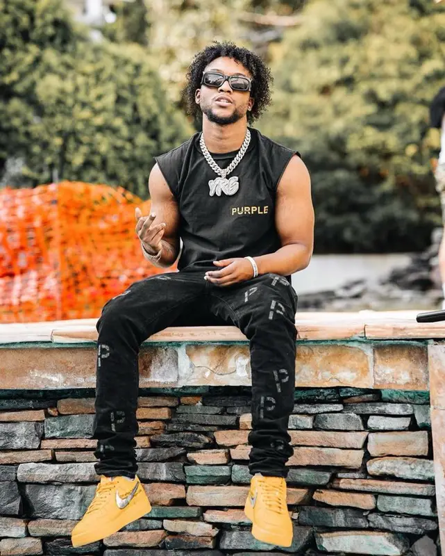 YourRAGE outfit in Purple Brand, Nike, and Balenciaga, 2023