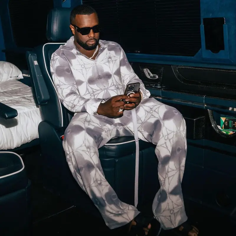 Gims outfit in Louis Vuitton, Prada, and Hermes, 2023