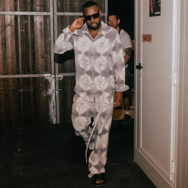 Gims outfit in Louis Vuitton, Prada, and Hermes, 2023