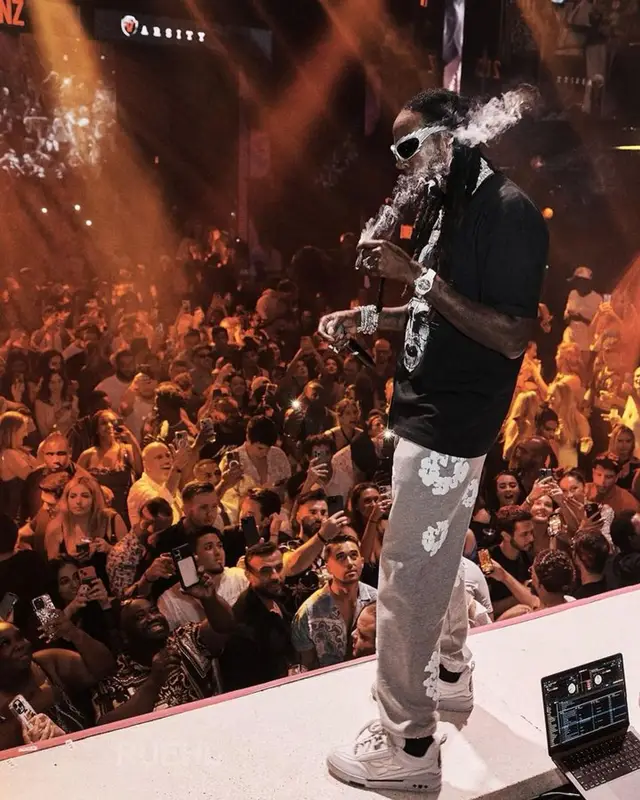 2 Chainz outfit in Supreme, Denim Tears, and Balenciaga, 2023