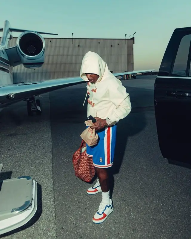 DaBaby outfit in Goyard and New Era, 2023
