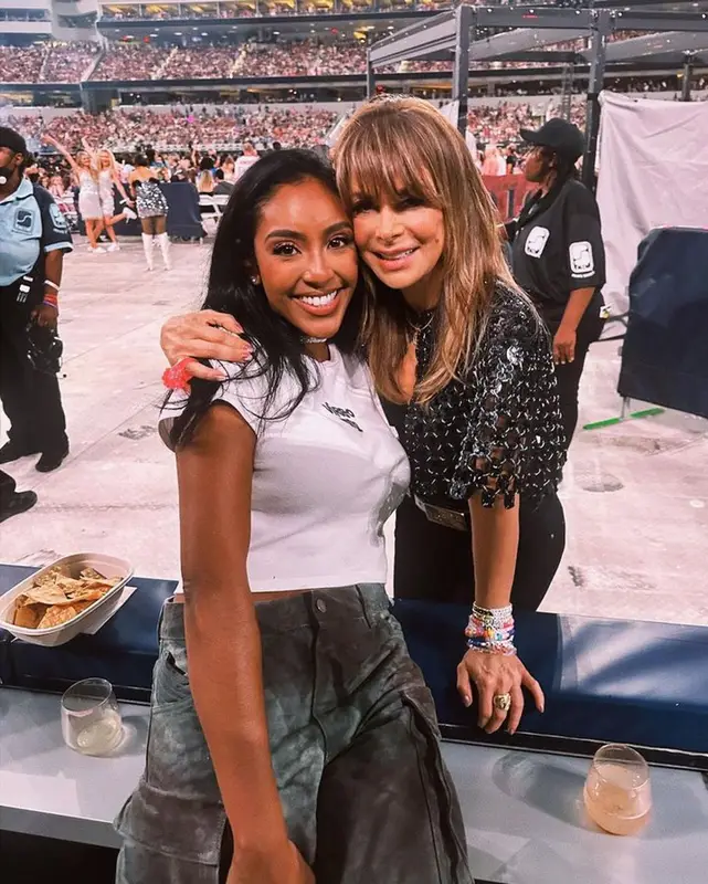 Tayshia Adams outfit in Réalisation, The Attico, and Amina Muaddi, 2023